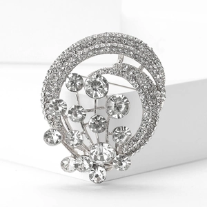 Detail of vintage hot air balloon brooch with sparkling rhinestones on alloy silver base
