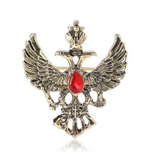 Broche vintage águila rusa de dos cabezas dorado con corona y piedra de gema roja