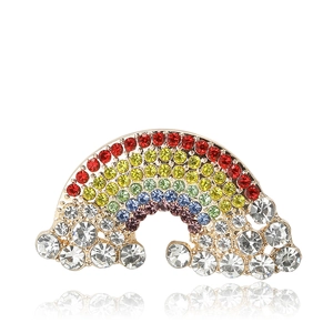 Sparkling rainbow brooch with colorful rhinestones and white crystals on a silver base