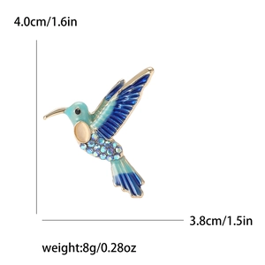 Spilla a forma di colibrì in smalto blu e strass viola, misura 4,0 cm x 3,8 cm