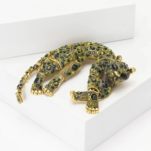 Luxurious gold alloy leopard brooch with sparkling green and black rhinestones