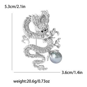Silver dragon brooch details showing crystal inlay and blue pearl with dimensions