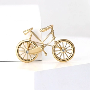 Creative bicycle brooch in gold-plated alloy with sparkling rhinestones on wheels