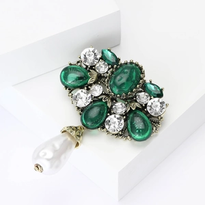 Vintage Baroque green rhinestone brooch with white teardrop pearl on geometric block