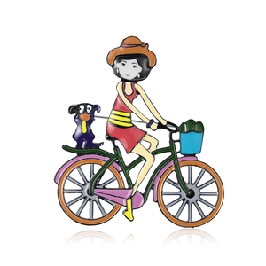 Acryl-Brosche mit einem Mädchen auf einem Fahrrad und Hund auf weißem Grund