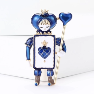 Detail showing vintage enamel crown soldier brooch with heart scepter and gold plating