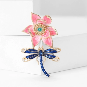 Elegant gold lotus and dragonfly enamel brooch with pink petals and blue gemstones