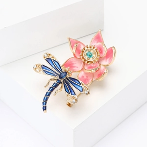Elegant gold alloy lotus and dragonfly brooch with blue enamel and sparkling crystals