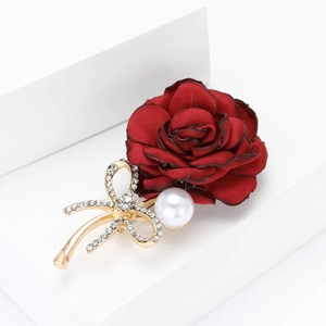 Elegant burgundy fabric rose brooch with gold bow base and pearls for women