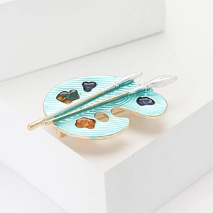 Künstlerische Emaille-Anstecknadel in Palettenform mit blauer Farbe und goldenen Details