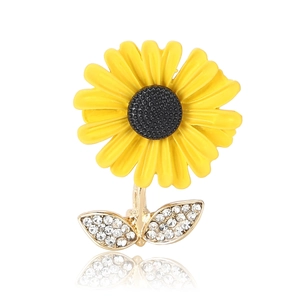 Charmante broche tournesol en émail jaune et finition dorée avec cristaux étincelants