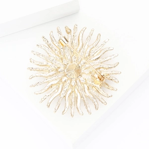 Detailed back view of golden sunflower brooch showing secure pin fastener structure