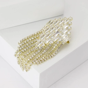 Elegant gold diamond brooch with geometric crystals and sparkling long chain tassels