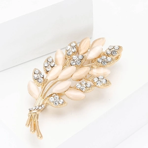 Elegante spilla a foglia dorata con pietre opale rosa occhio di gatto e strass brillanti