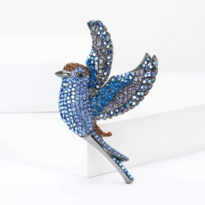Broche oiseau scintillante en alliage avec cristaux colorés pour vestes de costume