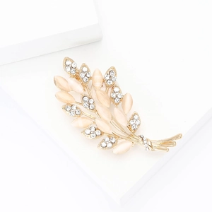 Elegante spilla a forma di spiga di grano con opale e strass su base dorata