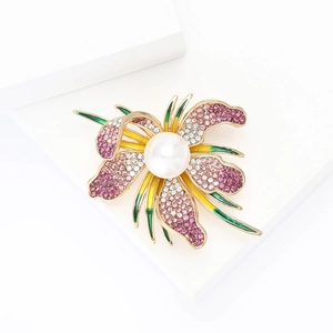 Elegant rhinestone orchid brooch with a large white pearl and pink gradient crystals