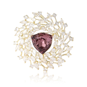 Exquisite gold-plated copper brooch with a large purple gemstone and star-like zircon pavé