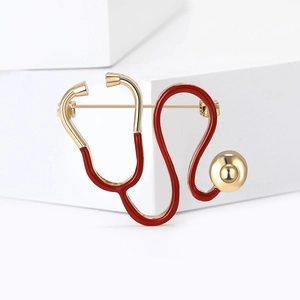 Broche stéthoscope créative en émail doré et rouge pour cadeau médical médecin ou infirmière