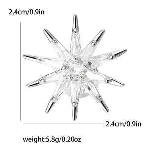 Macro shot of silver eight-point star brooch with micro-pave cubic zirconia crystals