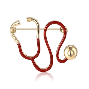 Broche stéthoscope créative en alliage doré avec émail rouge pour professionnels de santé