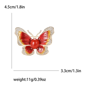 Vue détaillée de la broche papillon colorée montrant les dimensions 4,5cm par 3,3cm