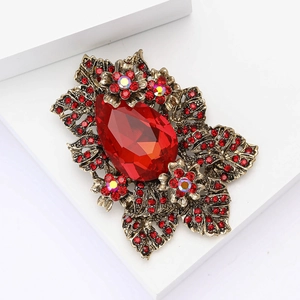 Broche vintage en alliage de bronze avec cristal rouge et strass aurora scintillants