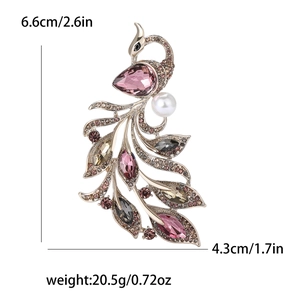 Golden alloy phoenix brooch with colorful rhinestones and pearl detail measurement view