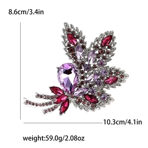 Detail of leaf-shaped flower brooch with purple crystals and precise dimensions