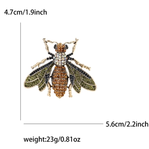 Luxury rhinestone bee brooch in gold finish with orange and green crystals, 5.6cm wide