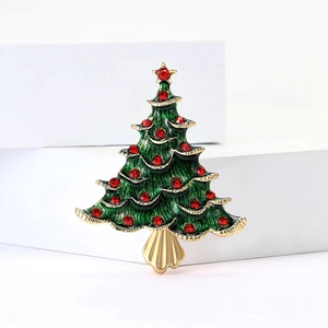 Broche sapin de Noël avec émail vert et strass rouges sur base en alliage doré