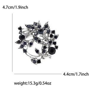Detailed size chart of vintage wreath brooch with silver finish and blue gems