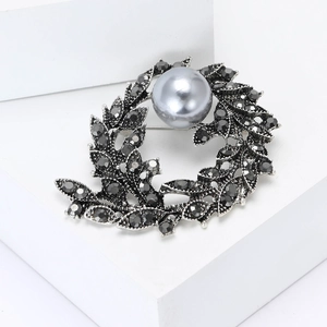 Vintage silver alloy branch brooch with grey rhinestones and large grey pearl centerpiece