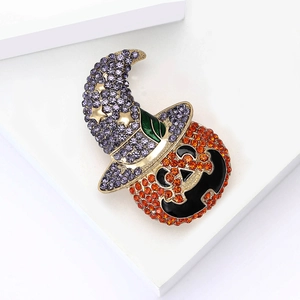 Halloween wizard pumpkin brooch with sparkling orange and purple rhinestones