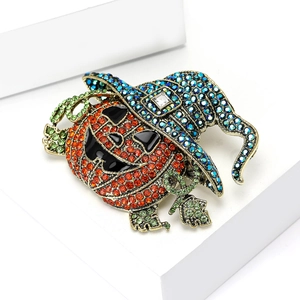 Creative Halloween pumpkin wizard brooch with colorful rhinestones on a white stand