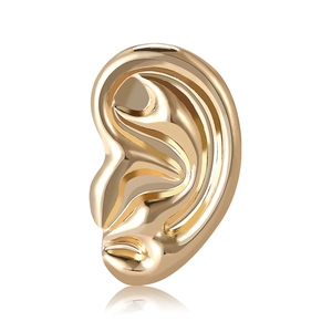 Polished gold metal ear-shaped brooch with creative artistic design for suit lapels