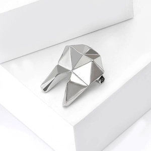 Minimalist silver geometric tooth brooch with polished metallic facets for men and women