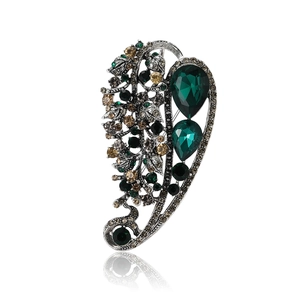 Vintage hollow leaf brooch with green rhinestones and antique silver alloy finish