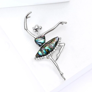 Elegant silver dancing girl brooch with iridescent abalone shell and crystal accents