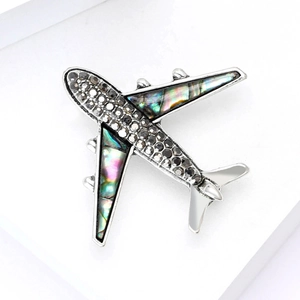 Broche avion tendance en alliage argenté avec ailes en abalone et strass gris brillants