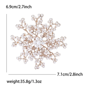 Elegant gold alloy snowflake brooch with white pearls, size 7.1cm x 6.9cm, high gloss finish