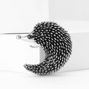Vintage hedgehog alloy enamel brooch with silver metallic spikes and black eye stone