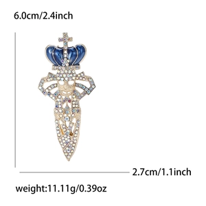 Detail of colorful rhinestone sword brooch with blue enamel crown and skull showing dimensions