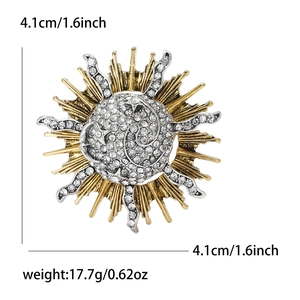 Vintage sunburst rhinestone brooch with star and moon design in gold and silver finish