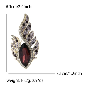 Exquisite gold alloy wing brooch with large dark red crystal and purple rhinestones