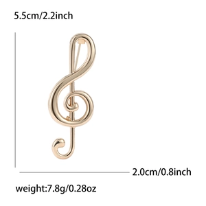 Broche clé de sol dorée polie pour costumes, dimensions 5,5cm par 2,0cm et poids 7,8g