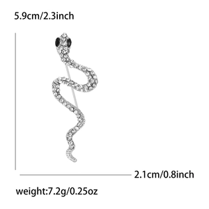 Broche serpent en alliage argenté avec strass blancs, dimensions 5,9 cm x 2,1 cm