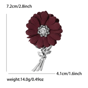 Elegant dark red fabric flower brooch with crystals and silver alloy stem on white background