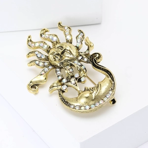 Broche soleil et lune vintage en alliage avec finition or antique et strass colorés