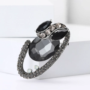 Vintage oval gray crystal brooch with rhinestones set on silver alloy base